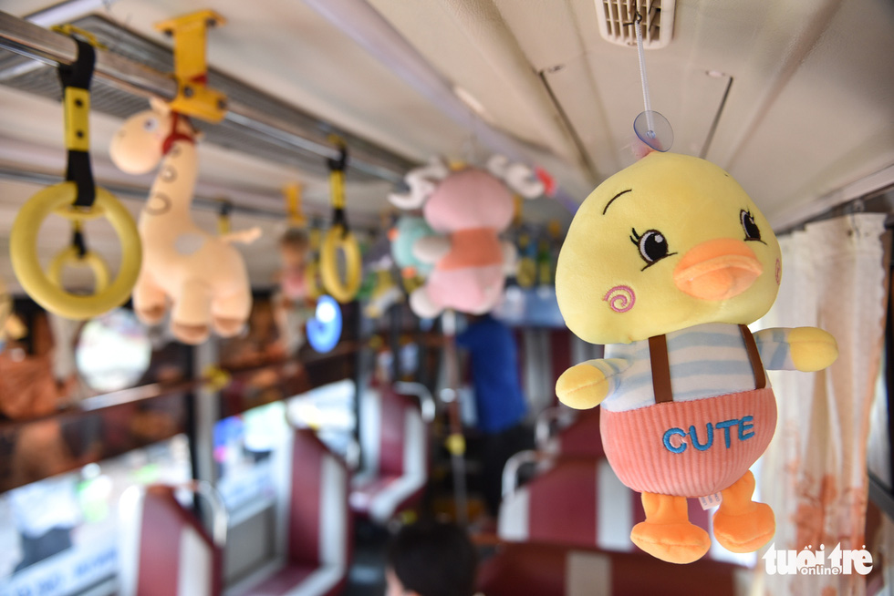 A vehicle running bus route No. 146 in Ho Chi Minh City is embellished with plush toys. Photo: Ngoc Phuong / Tuoi Tre