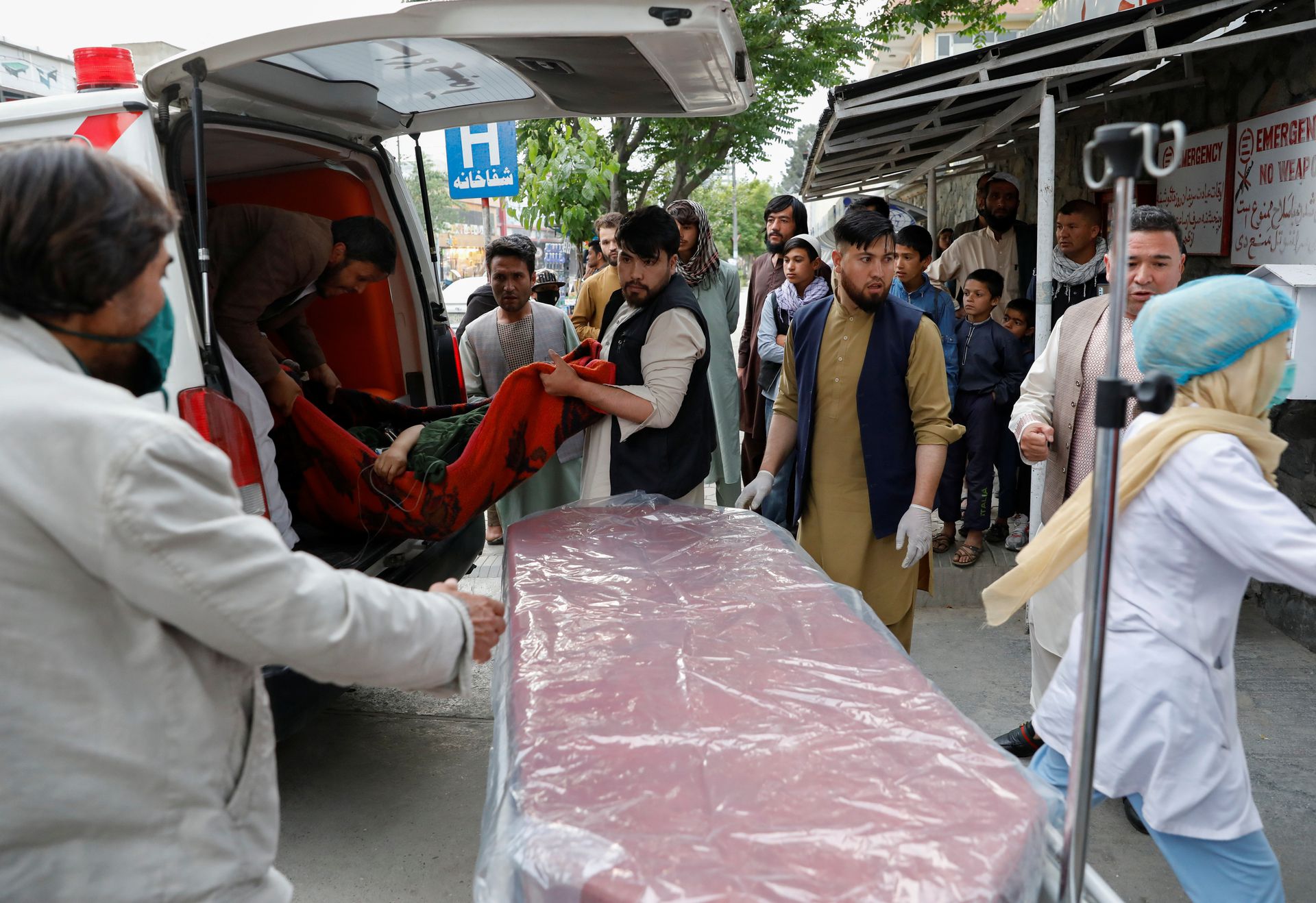 An injured person is transported to a hospital after a blast in Kabul, Afghanistan May 8, 2021. Photo: Reuters