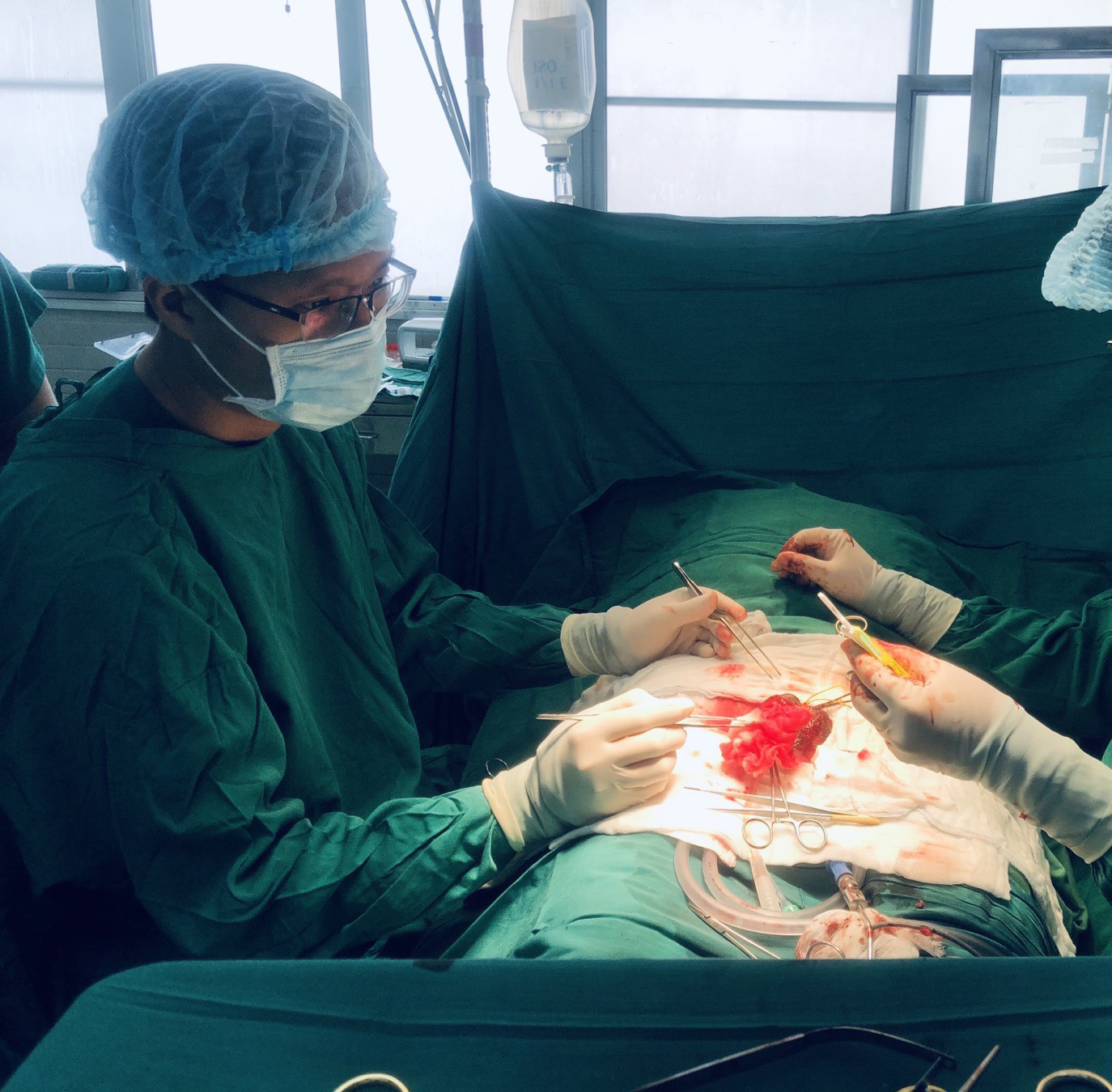 Doctors at Cho Ray Hospital in Ho Chi Minh City perform a surgery to reattach a man’s penis in this supplied photo.