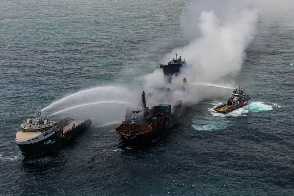 Smoke rises from a fire onboard the MV X-Press Pearl vessel in the seas off the Colombo Harbour, in Sri Lanka May 30, 2021. Photo: Sri Lanka Airforce Media/Handout via Reuters