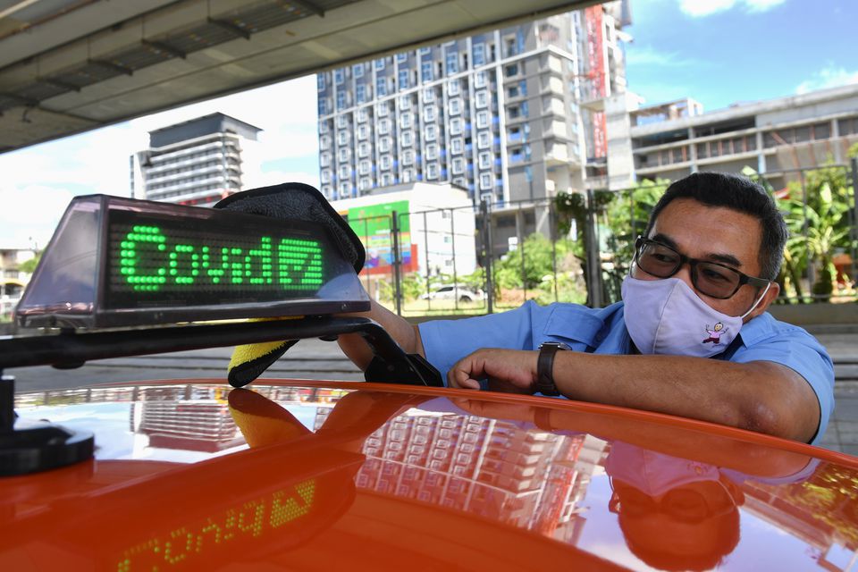 Taxi for hire! Bangkok cabbie hopes to capitalise on his COVID-19 shot