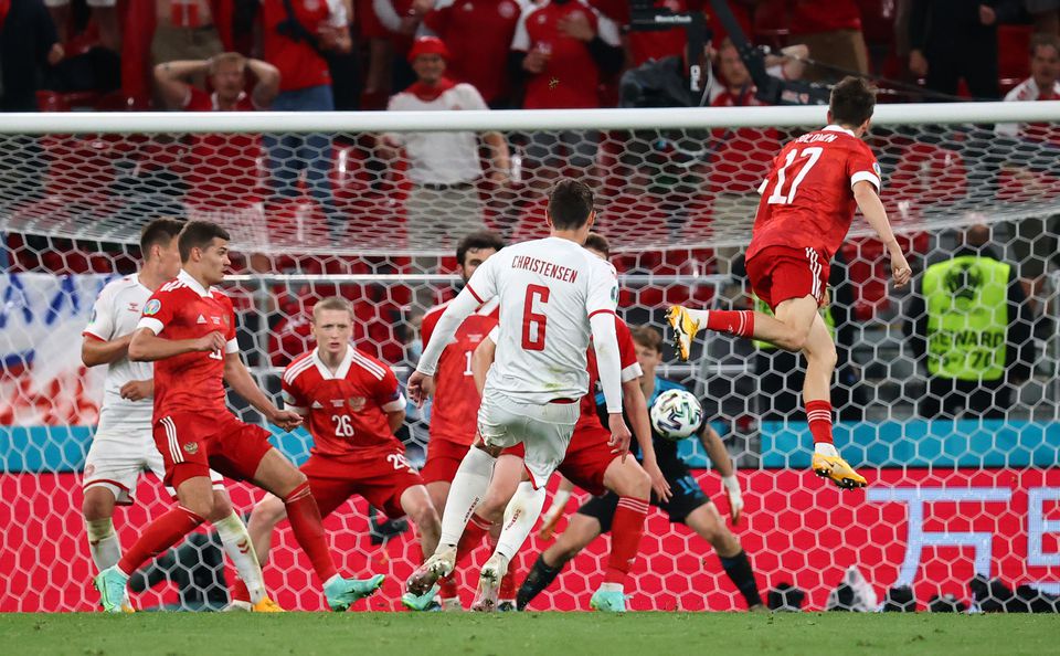 Soccer Football - Euro 2020 - Group B - Russia v Denmark - Parken Stadium, Copenhagen, Denmark - June 21, 2021 Denmark's Andreas Christensen scores their third goal. Pool via Reuters