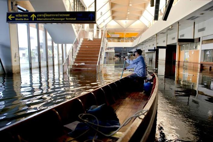 Flooding can threaten key infrastructure like this airport in Bangkok, deluged during huge 2011 floods. Photo: AFP