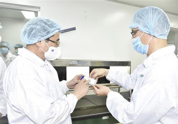 Vietnamese premier urges to make first local COVID-19 vaccine available by next June
