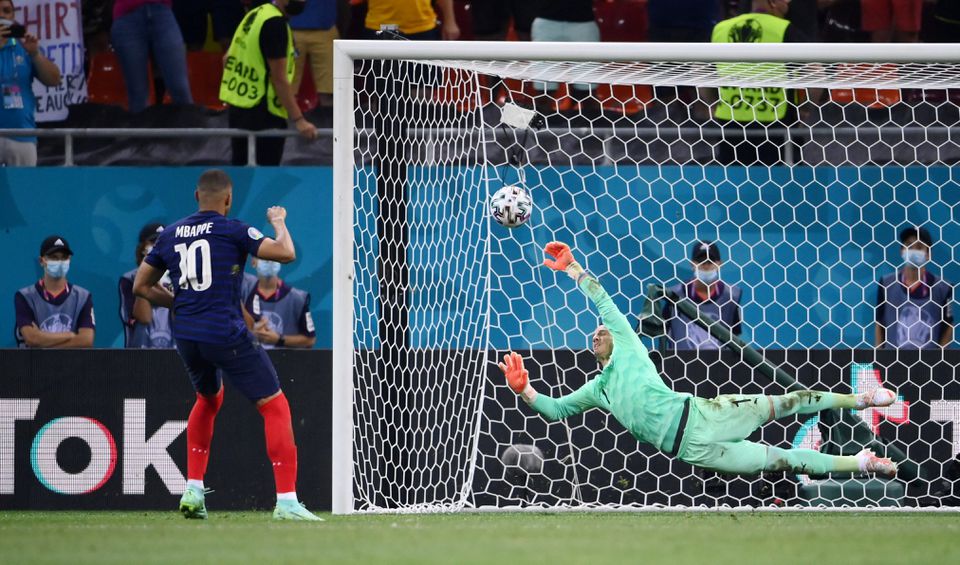 Soccer Football - Euro 2020 - Round of 16 - France v Switzerland - National Arena Bucharest, Bucharest, Romania - June 29, 2021 France's Kylian Mbappe has a penalty saved by Switzerland's Yann Sommer during the shoot-out. Pool via Reuters