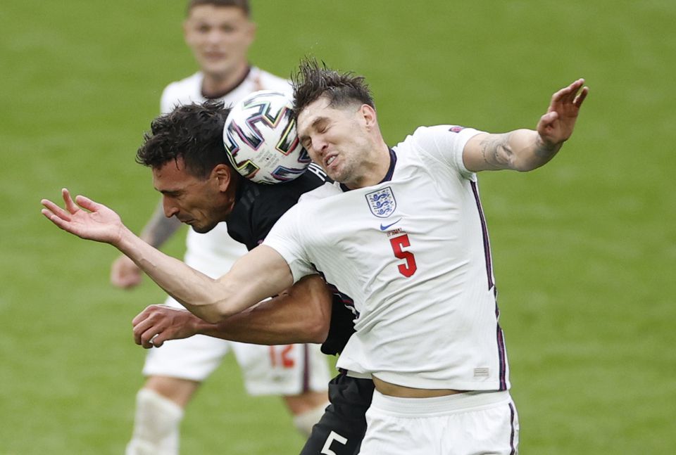 Soccer Football - Euro 2020 - Round of 16 - England v Germany - Wembley Stadium, London, Britain - June 29, 2021 England's John Stones in action with Germany's Mats Hummels. Photo: Pool via Reuters