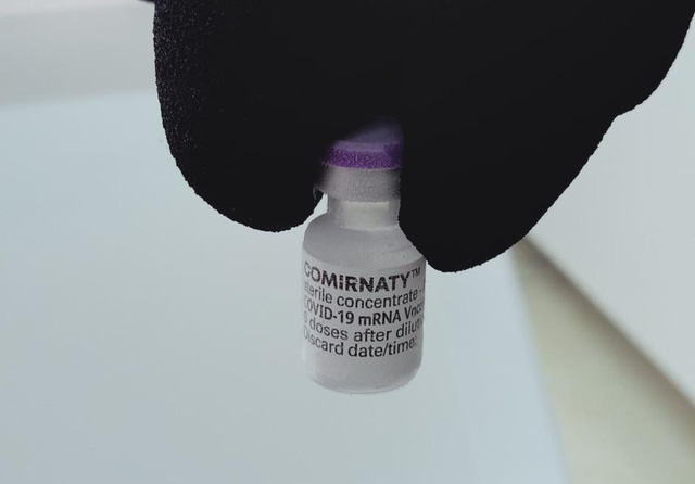 A bottle of Pfizer/BioNTech COVID-19 vaccine is pictured at the National Institute of Hygiene and Epidemiology in Hanoi, July 7, 2021. Photo: B.D. / Tuoi Tre