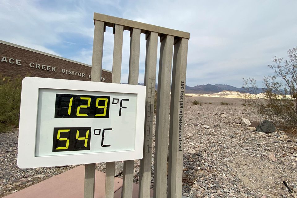 The thermometer at the Furnace Creek Visitor Center at Death Valley National Park shows temperatures reading 129 degrees Fahrenheit (53.8 C) in Death Valley, California, U.S. June 16, 2021. Photo: Reuters