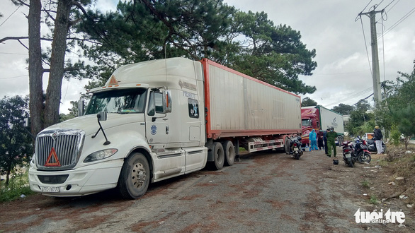 Container trucks are pulled over for inspection in Da Lat City, Lam Dong Province, Vietnam. Photo: Dam Trong / Tuoi Tre