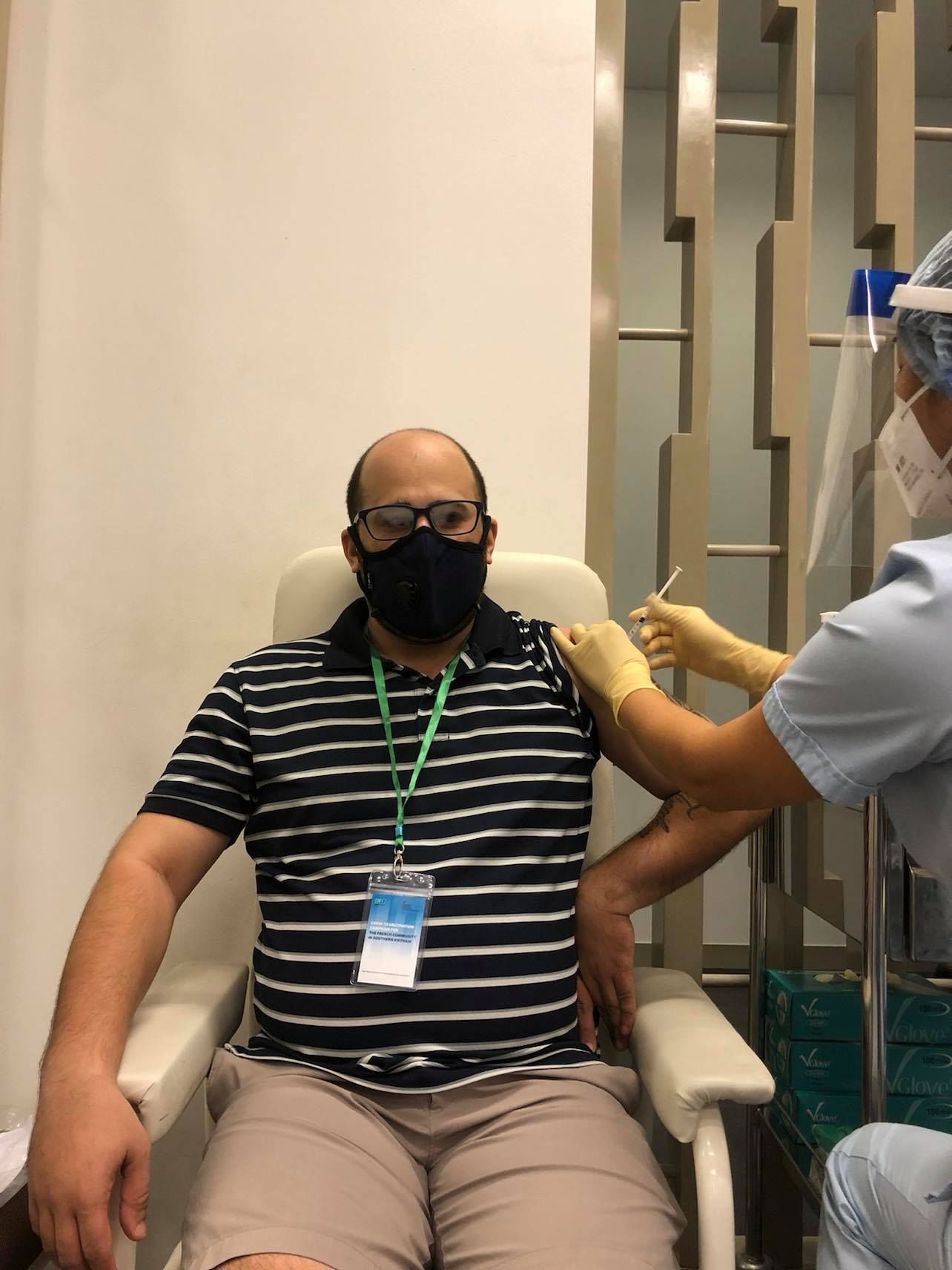 Frenchman Raphael Galuz is getting a Moderna jab against COVID-19 at FV Hospital through a vaccination campaign run by the French Consulate General in Ho Chi Minh City on July 31, 2021. Photo provided by Galuz
