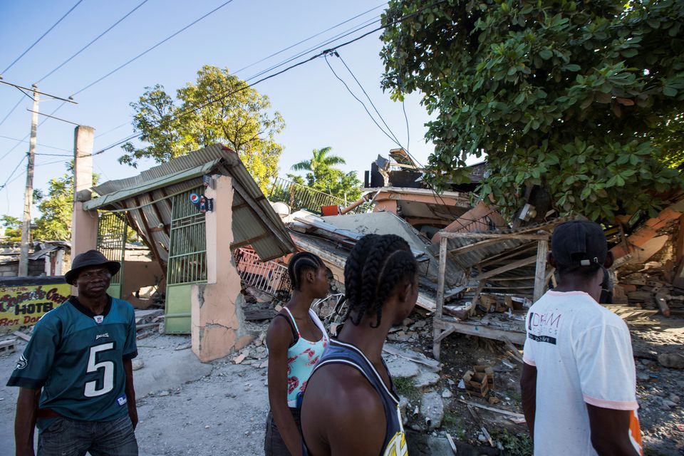 Haiti hospitals overwhelmed by quake victims as death toll hits 1,297