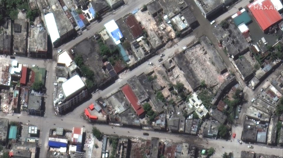 A satellite image shows collapsed buildings in Les Cayes, after a 7.2 magnitude earthquake struck Haiti, August 15, 2021. SATELLITE IMAGE 2021 MAXAR TECHNOLOGIES/Handout via Reuters