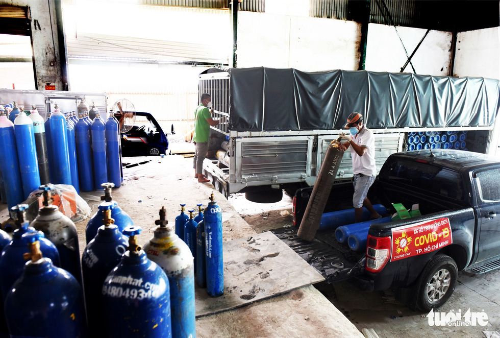 Some oxygen cylinders are stored in a warehouse from which Huynh Quang Nhat Long transfers them to anywhere in the city when he receives calls for help during the pandemic. Photo: Duyen Phan / Tuoi Tre News