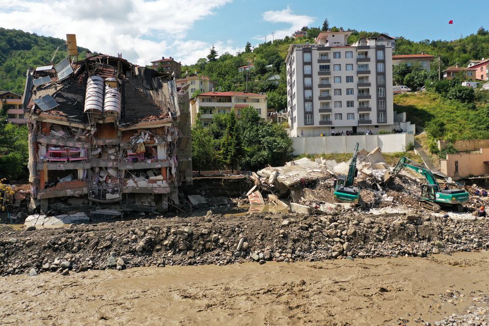 A view shows a partially collapsed building, as the area was hit by flash floods that swept through towns in the Turkish Black Sea region, in the town of Bozkurt, in Kastamonu province, Turkey, August 14, 2021. Picture taken with a drone. Photo: Reuters