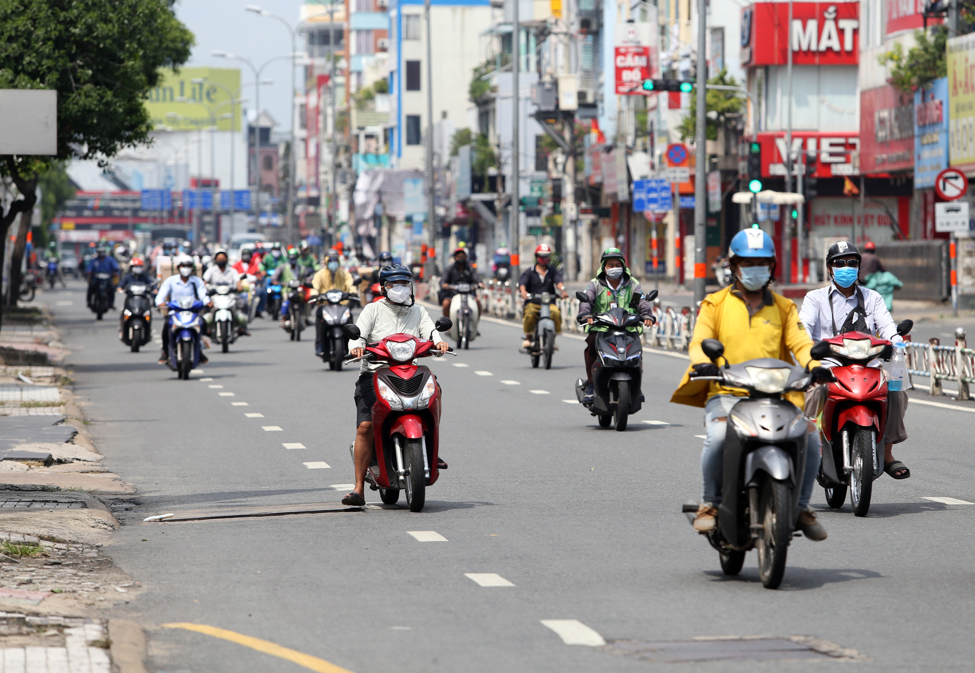 Vietnam's biggest city issues stay-home order as COVID-19 deaths soar