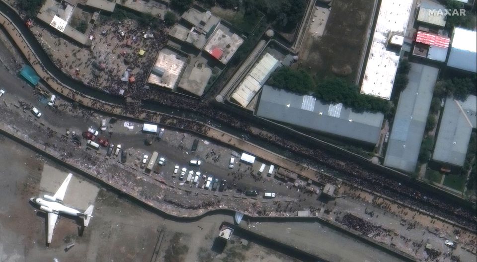 A close-up of crowds near the Abbey Gate at Hamid Karzai International Airport, in Kabul, Afghanistan August 23, 2021, in this satellite image obtained by Reuters on August 26, 2021. Satellite image 2021 Maxar Technologies/Handout via Reuters