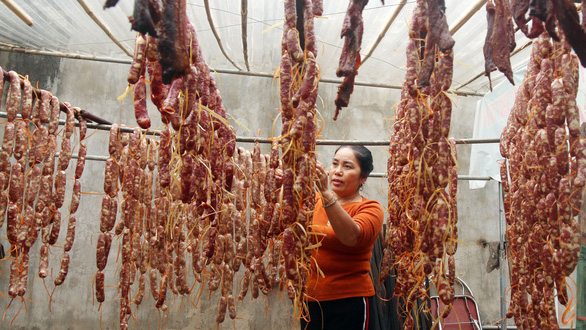 Lap xuong sausage is dry-cured in Nghe An Province, Vietnam. Photo: Dao Tho / Tuoi Tre