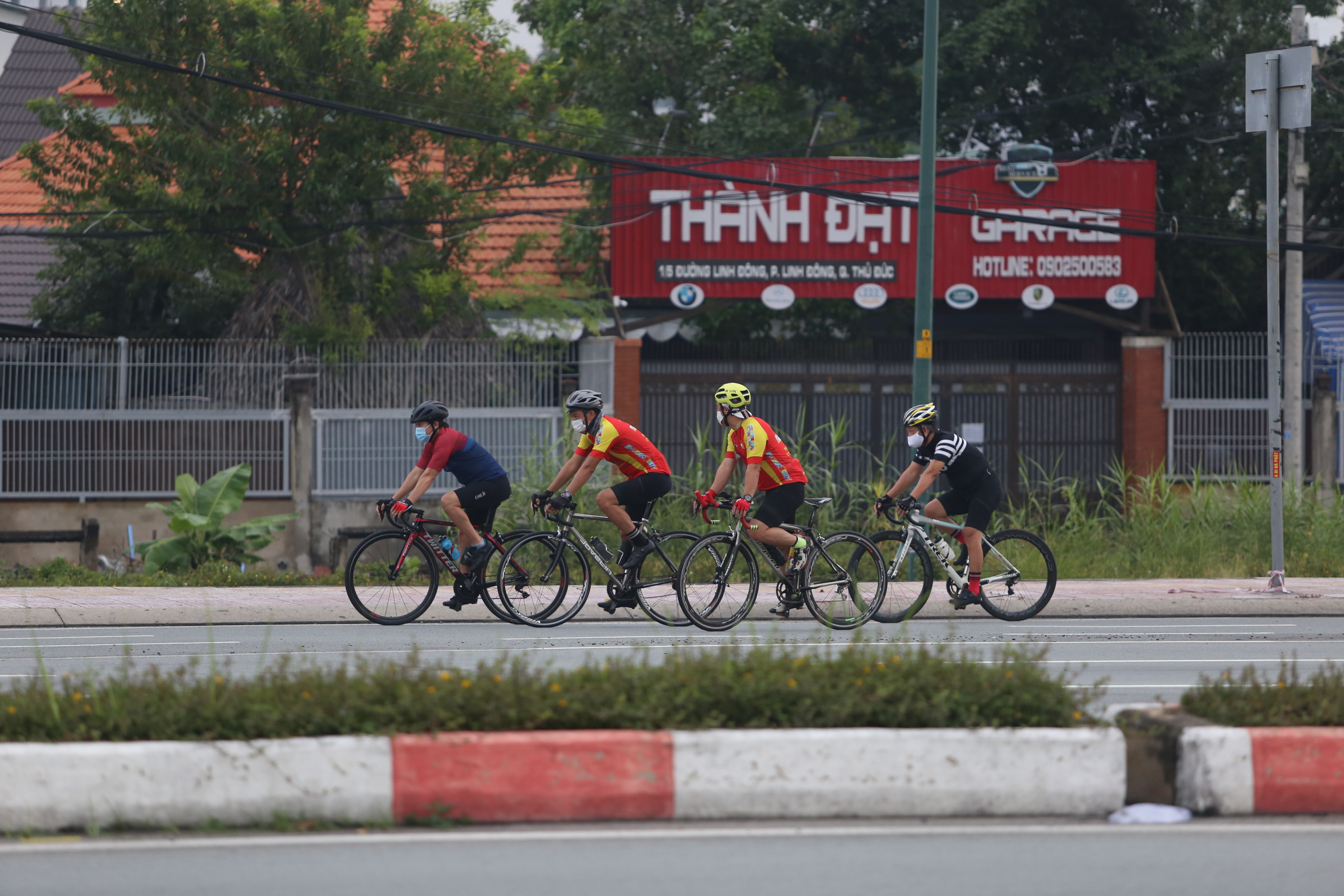 Residents cycle along a street in Ho Chi Minh City, October 1, 2021. Photo: Le Phan / Tuoi Tre