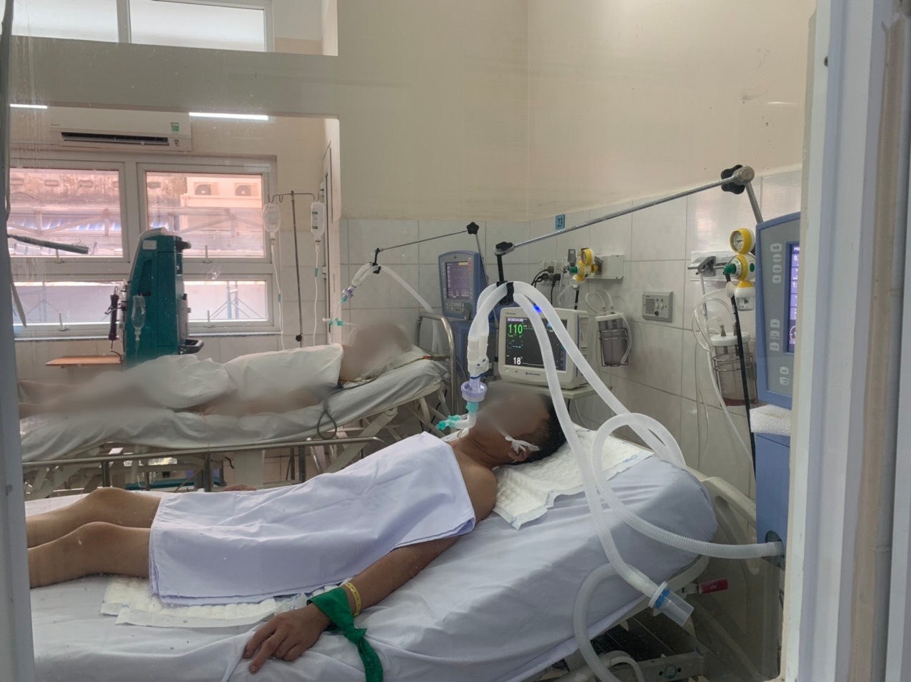 Patients are treated for alcohol poisoning at Thong Nhat Hospital in Ho Chi Minh City in this supplied photo.
