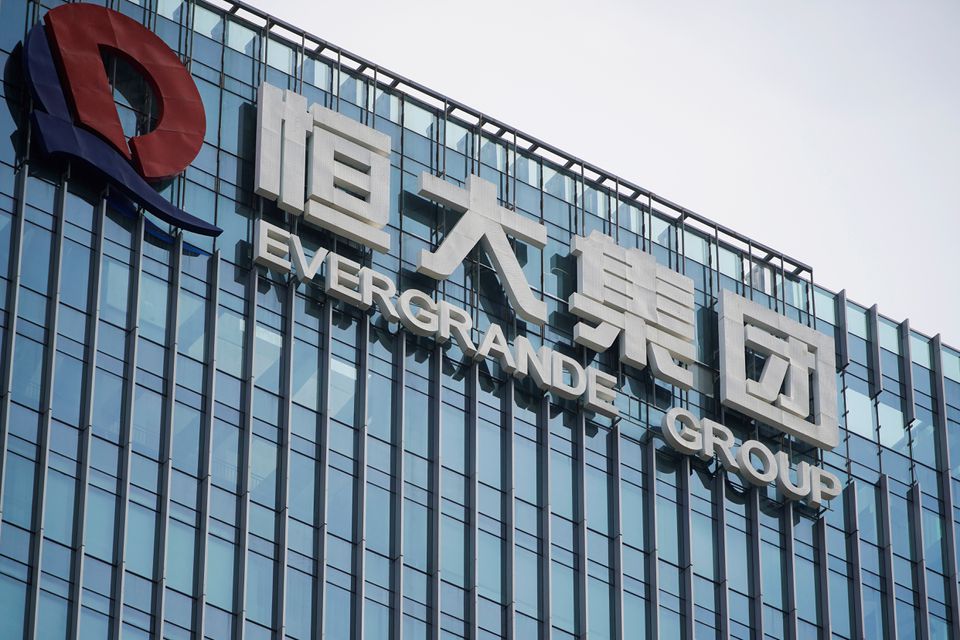 China Evergrande trading halt spurs asset sale speculation
