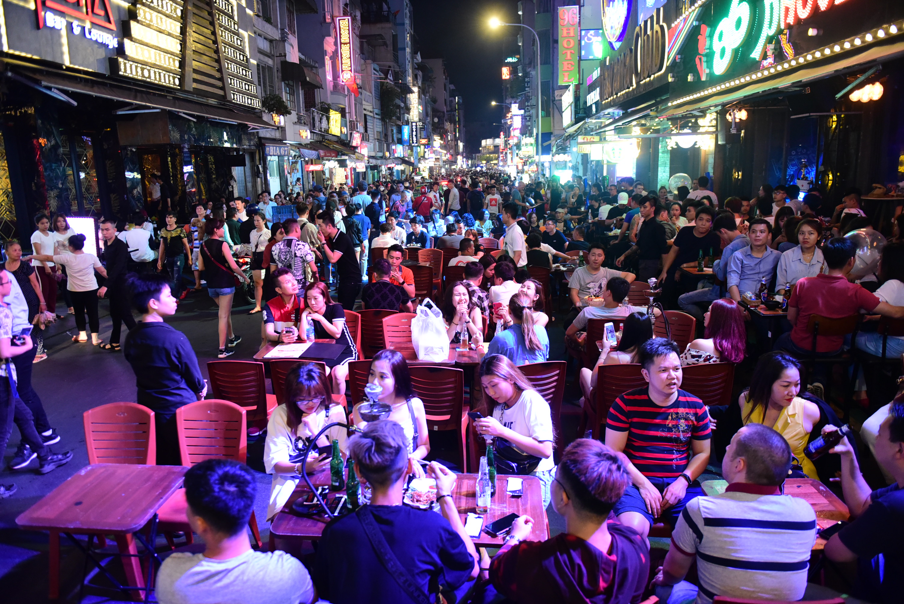 Bui Vien Street in Ho Chi Minh City’s District 1 is packed with visitors in a photo taken on a weekday at around 10pm on April 11, 2019. Photo: Quang Dinh / Tuoi Tre