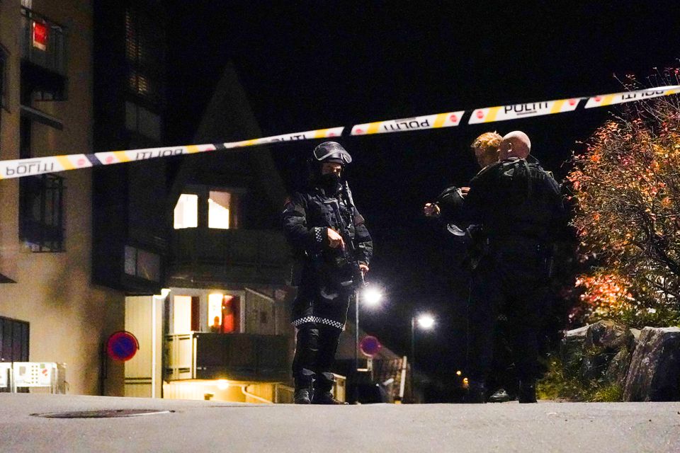Police officers investigate after several people were killed and others were injured by a man using a bow and arrows to carry out attacks, in Kongsberg, Norway, October 13, 2021. Photo: Hakon Mosvold/NTB/via Reuters