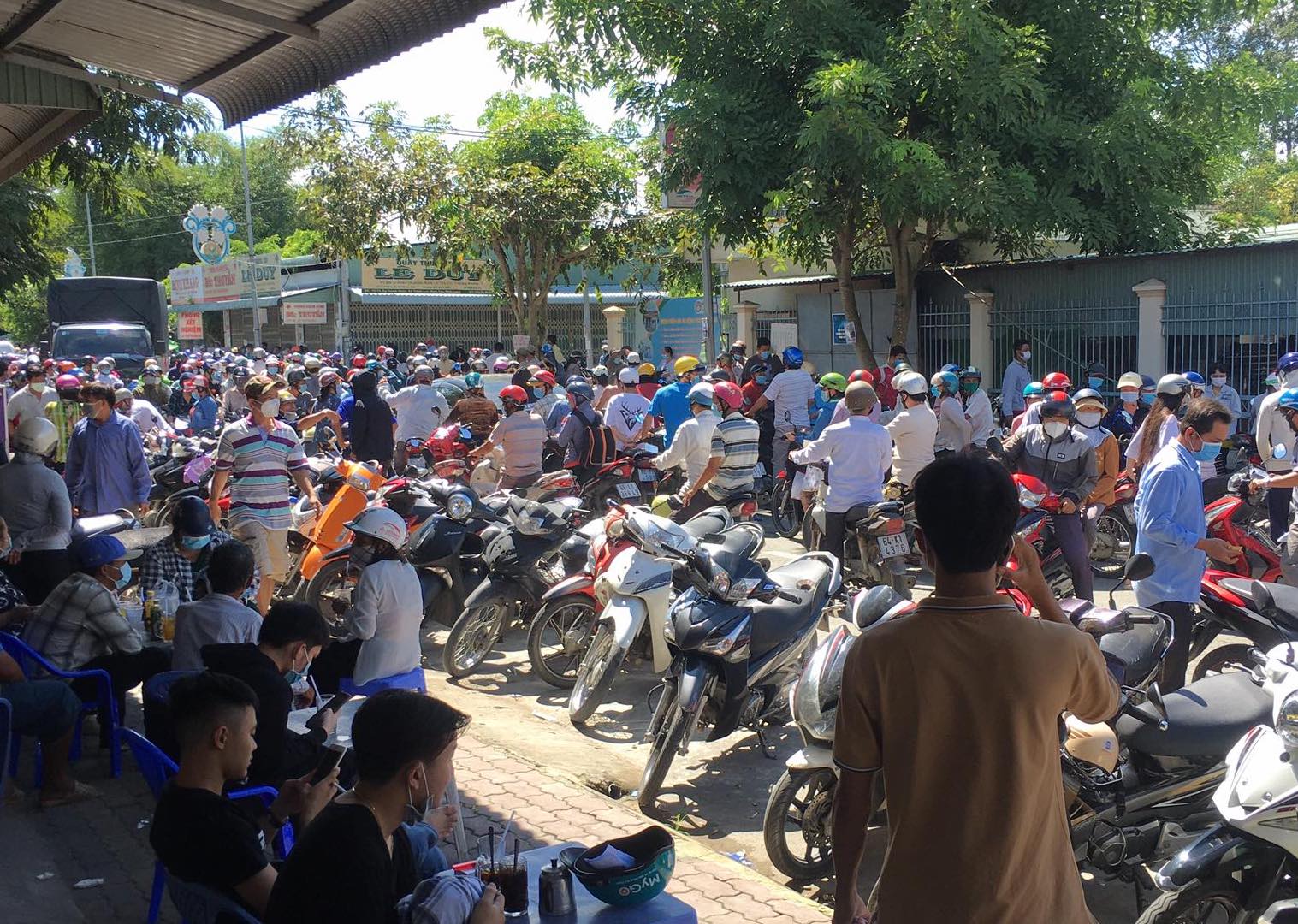Residents crowd medical center registering for COVID-19 vaccine slots in Vietnam's Mekong Delta