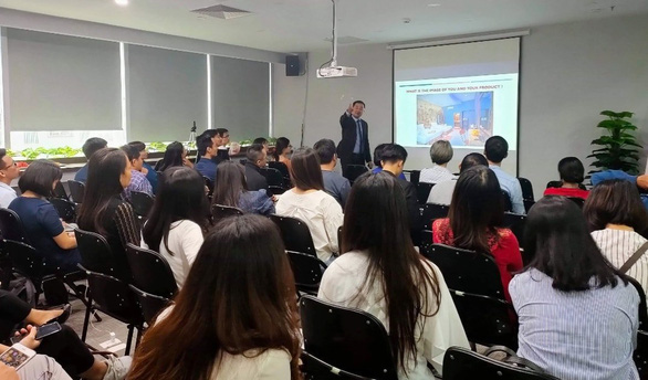 Alex Ho delivers a presentation at an event with CohostAI hosts in Ha Noi in November 2019 in this supplied photo.