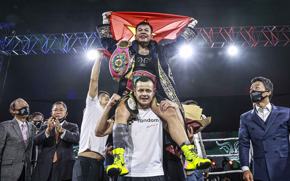 Vietnamese boxer shows determination after winning historic WBO world title