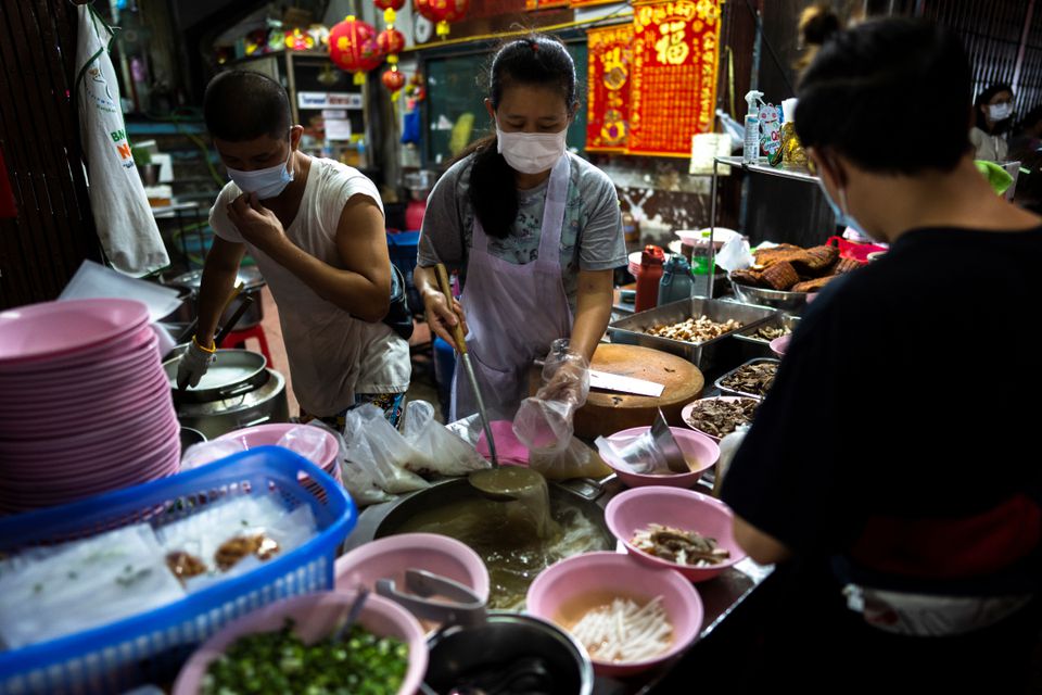 Heirs step up as COVID deaths rock Bangkok's famous street-food stalls