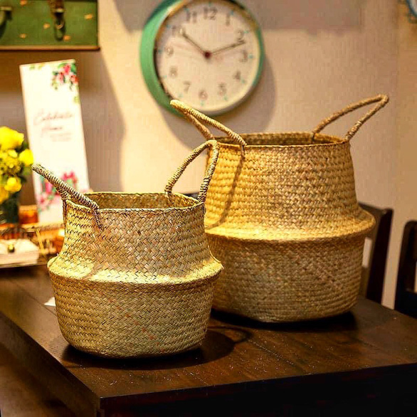 Two straw bags were made by Pham Xuan Long’s grandfather in a supplied photo