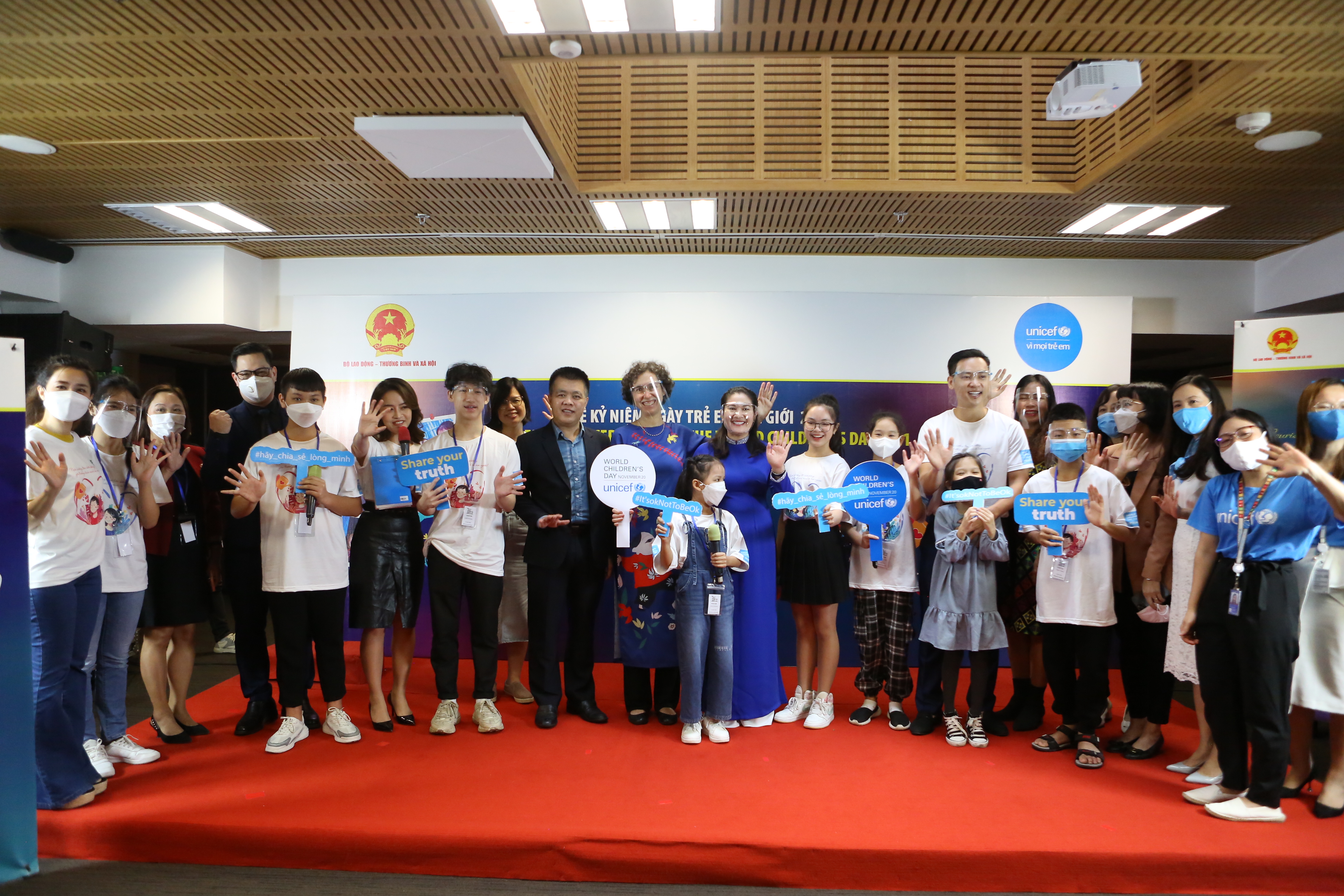 This supplied photo shows children and delegates at an event to celebrate World Children’s Day in Hanoi, Vietnam, November 17, 2021.