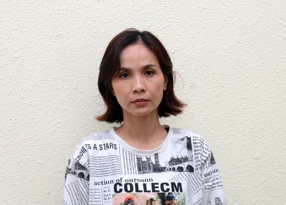 This photo shows Nguyen Thi Hanh when she was arrested by police of Ba Ria - Vung Tau Province. Photo: Quynh Giang / Tuoi Tre