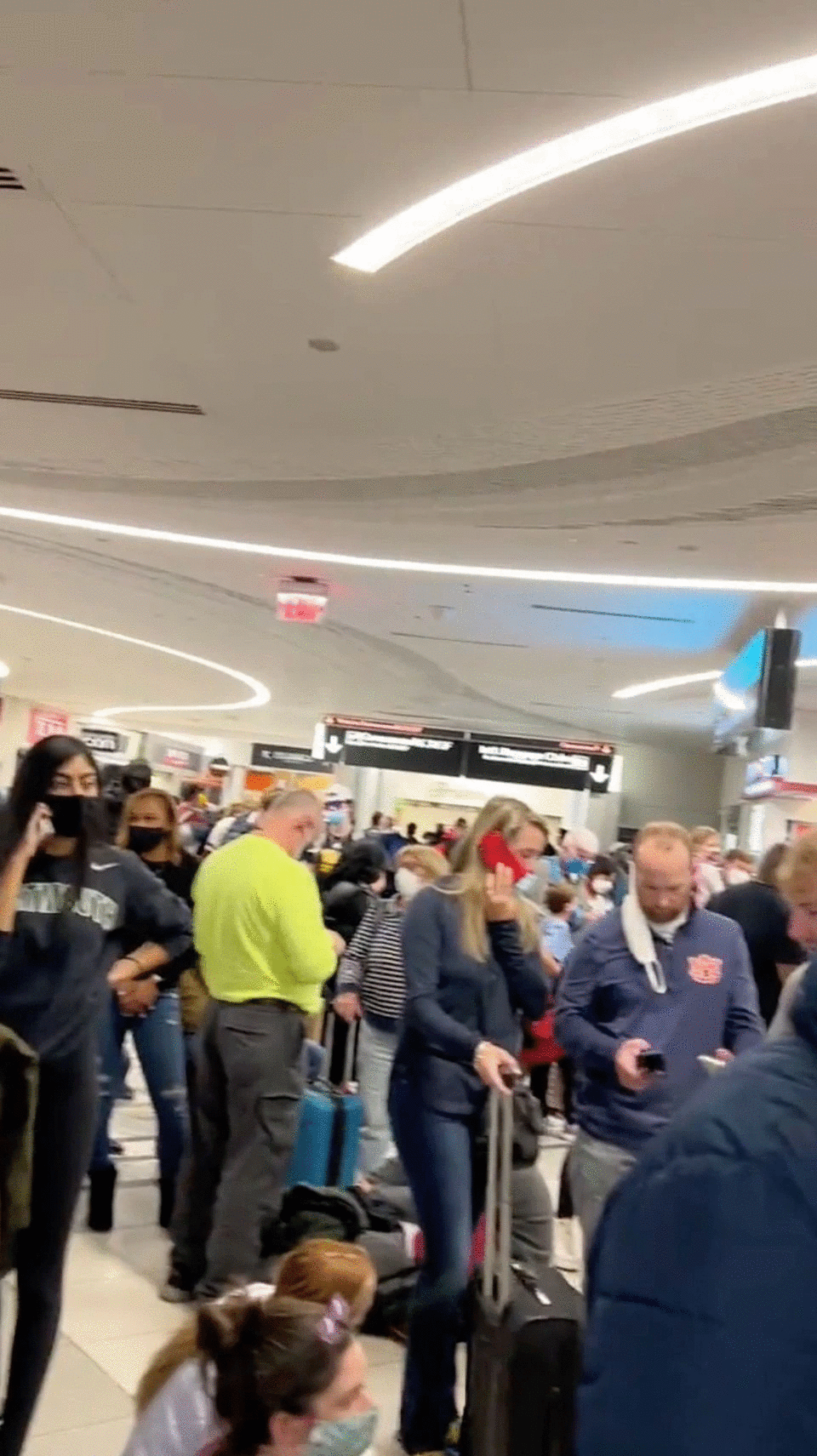 People gather to leave Hartsfield-Jackson Atlanta International Airport after reported shooting, in Atlanta, Georgia, U.S., November 20, 2021, in this still image obtained from a social media video. Photo: Twitter/mohiterajas/via Reuters