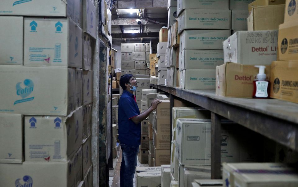 A worker inspects boxes of Reckitt's Dettol handwash at a distributor's warehouse before loading them onto a truck for delivery to retailers in Mumbai, India, September 17, 2021. Picture taken September 17, 2021. Photo: Reuters
