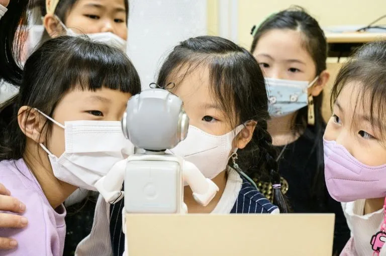 With a camera on its helmet, the robot takes photos that are instantly sent to a tablet for viewing. Photo: AFP