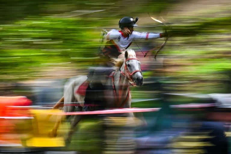 Horseback archery requires intensive training before riders can shoot targets while moving at speed. Photo: AFP
