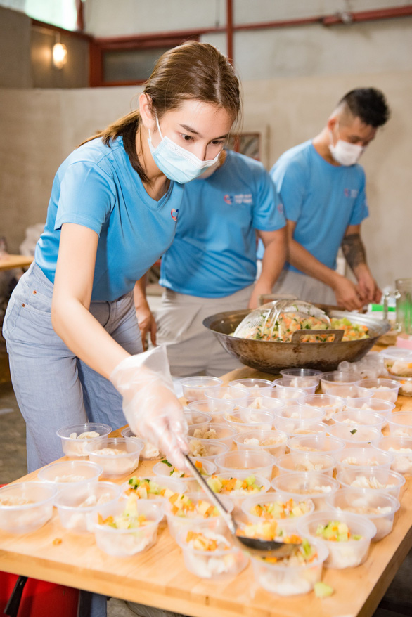 This supplied image shows Nguyen Thuc Thuy Tien taking part in a charity activity in Vietnam.