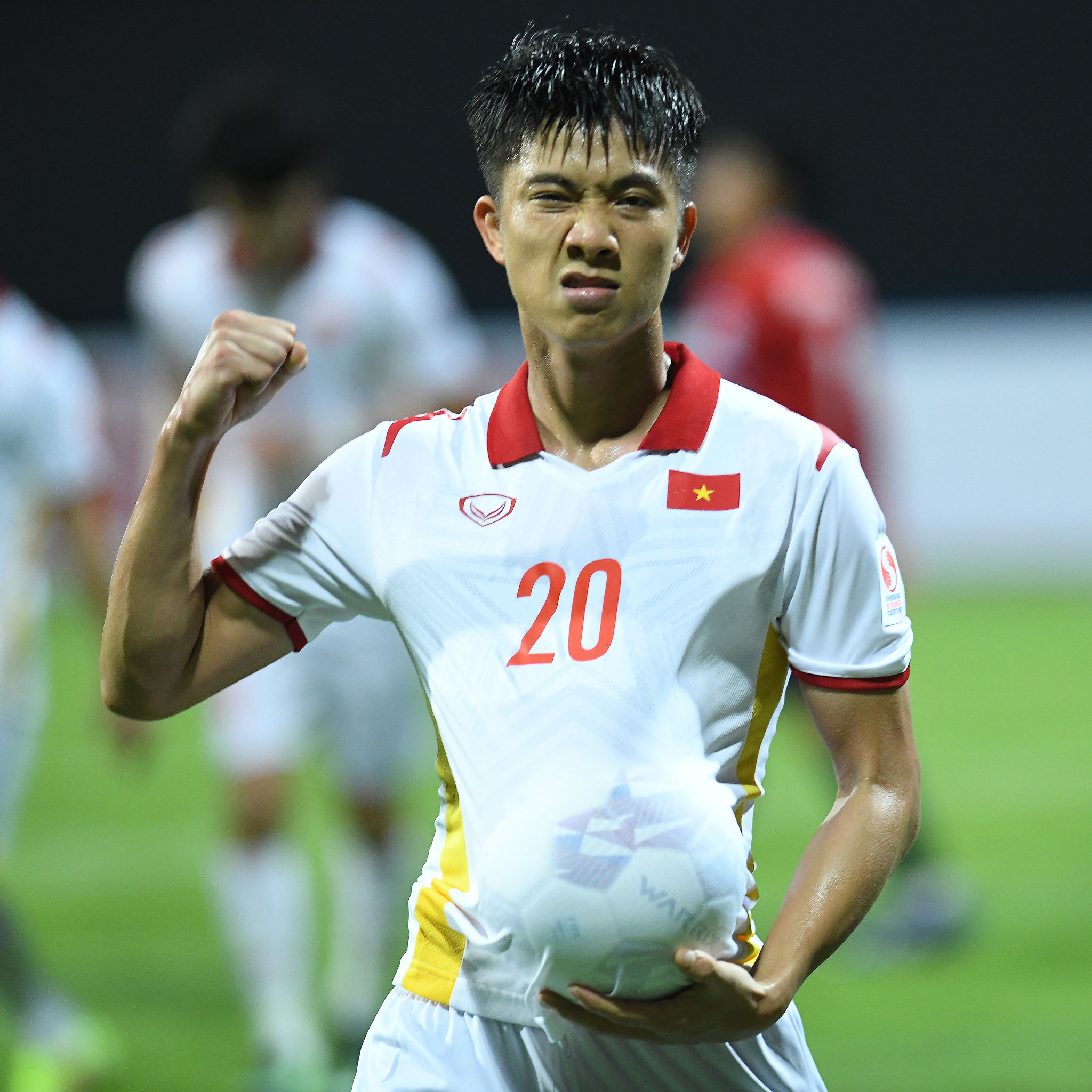 Vietnam’s Phan Van Duc celebrates a goal during their opening match against Laos in Group B of the 2020 AFF Suzuki Cup in Singapore, December 6, 2021. Photo: Getty Images