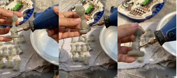 This supplied photo shows the polishing process of a chessman from the Co Ao Viet board game.