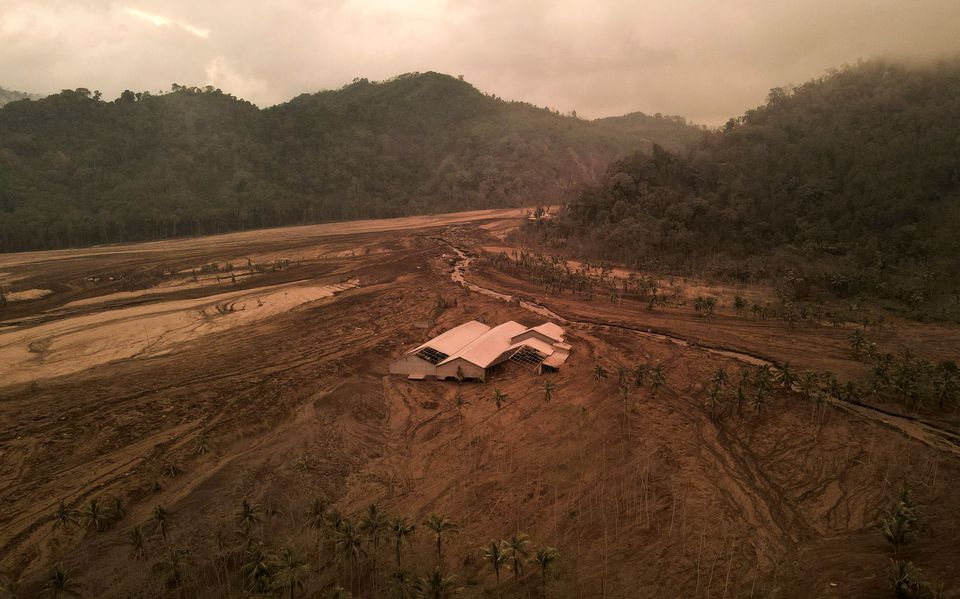 A damaged building is seen in an area affected by the eruption of Mount Semeru volcano in Candipuro district, Lumajang, Indonesia, December 7, 2021. Picture taken with a drone. Photo: Reuters