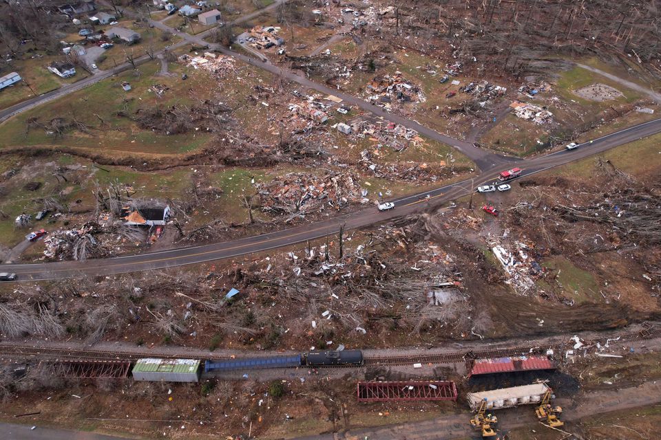 A derailed train is seen amid damage and debris after a devastating outbreak of tornadoes ripped through several U.S. states in Earlington, Kentucky, U.S. December 11, 2021. Photo: Reuters