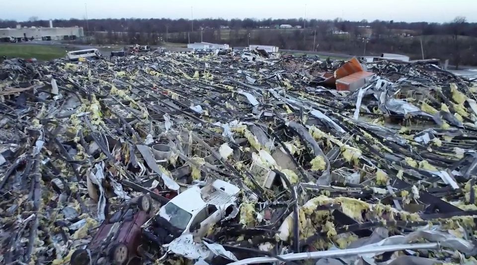 Aerial view of a candle factory after a tornado tore through, in Mayfield, Kentucky, U.S., December 11, 2021, in this still image taken from a video. Video taken with a drone. Photo: Michael Gordon/Storm Chasing Video via Reuters