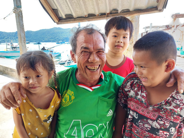 50-year-old orphan finds peaceful life on Vietnam’s ‘island of aquamen’