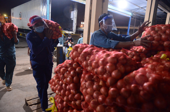 Chinese farm produce, with some carrying fake Vietnam-grown labels, floods domestic market