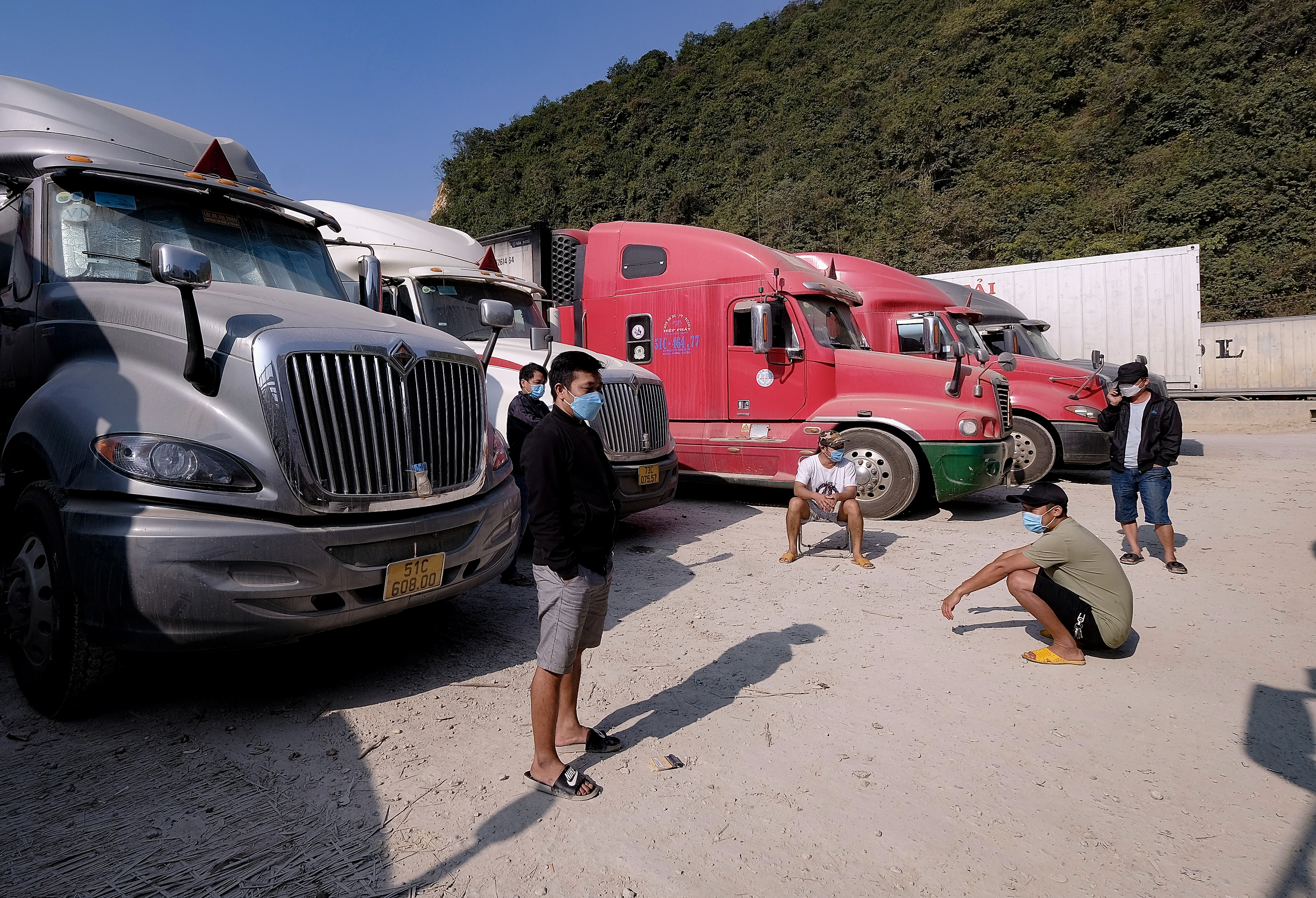 A group of truck drivers is pictured at Tan Thanh Border Gate in Lang Son Province, December 18, 2021. Photo: Nam Tran / Tuoi Tre