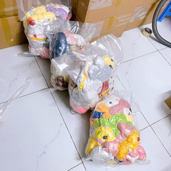 After being processed by vacuum sealing, all of Le Nhu’s toys can be packed in four plastic bags like this. Supplied photo