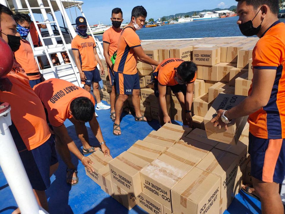 Philippine Coast Guard personnel unload packs of relief goods for victims of Typhoon Rai, in Bacolod City, Negros Occidental, Philippines, December 21, 2021. Philippine Coast Guard/Handout via Reuters