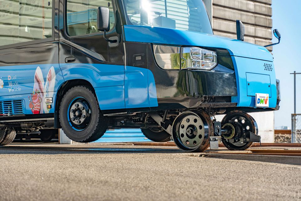 The parts of rubber tires and train wheels of a 'Dual-Mode Vehicle (DMV)' bus that can run both on conventional road surfaces and a railway track, are seen during its test run in Kaiyo Town, Tokushima Prefectue, Japan, in this handout photo taken in March 2021 and released by Tokushima Prefectural Government, obtained by Reuters on December 24, 2021. Tokushima Prefectural Government/Handout via Reuters