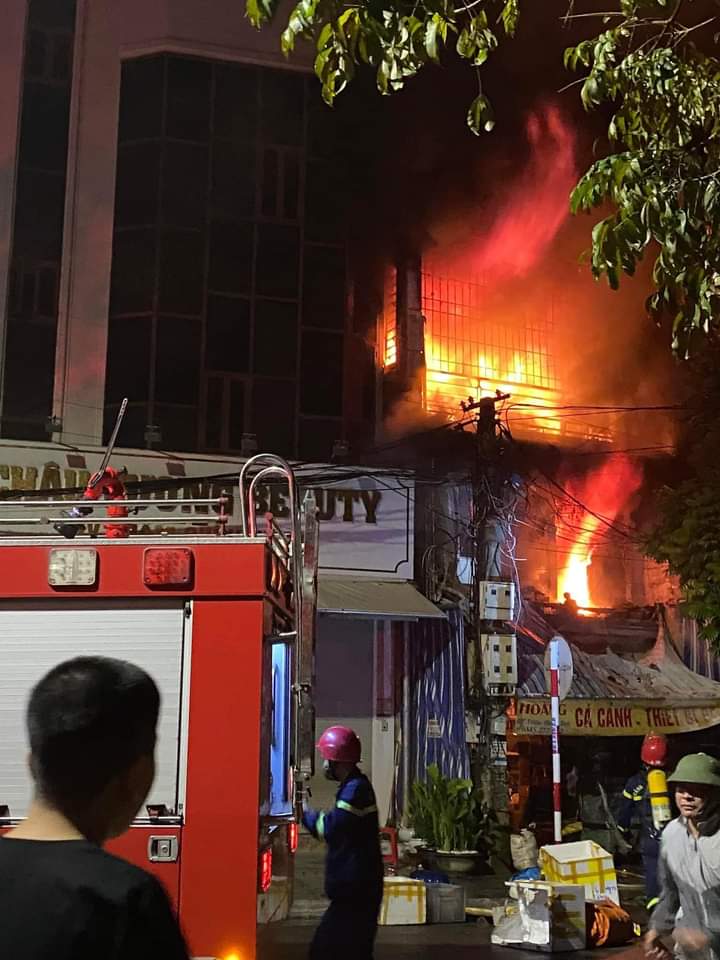A fire breaks out at a three-story house in Thanh Hoa Province, Vietnam, December 27, 2021 in this photo supplied by a local resident.